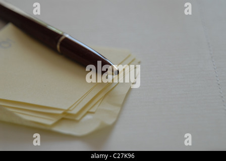 Pen and adhesive notes. Stock Photo