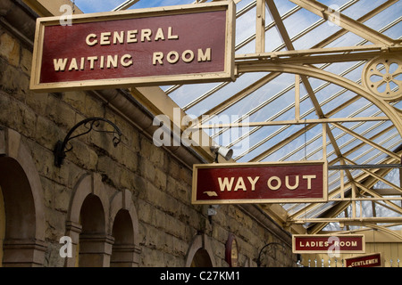 Wooden Hanging Station Signs at Ramsbottom Station, East Lancs Railway, Lancashire, UK Stock Photo