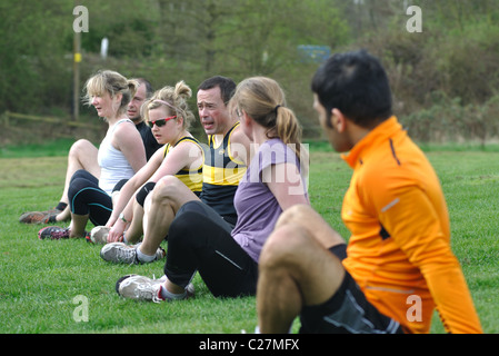 Runners doing exercises Stock Photo