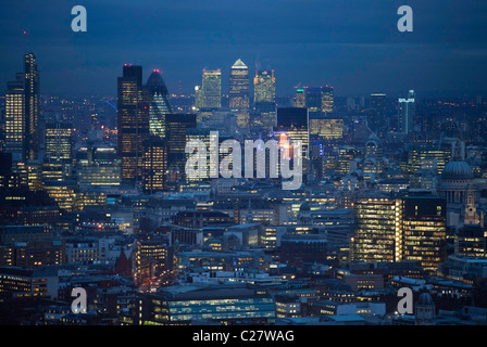 A view of the city of London at night from the top of the BT tower. The square mile and Canary Wharf can be seen.