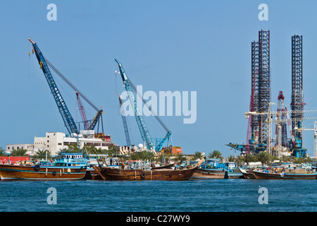 The dow and shipping facilities at Port Khalid in Sharjah, UAE. Stock Photo