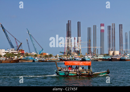 The dow and shipping facilities at Port Khalid in Sharjah, UAE. Stock Photo