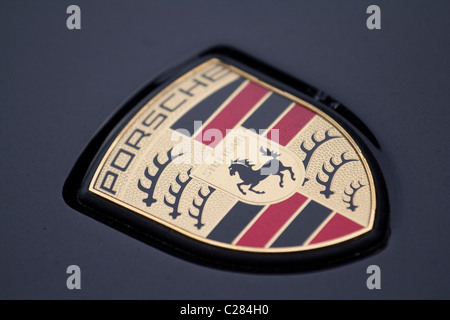 Close-up of a Porsche badge on a car in London, UK Stock Photo