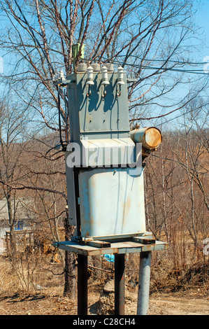 a hight voltage powerplant transformer on a switchyard Stock Photo