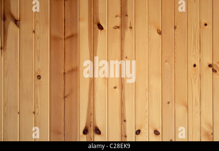 Vertical background texture of knotty pine boards. Stock Photo