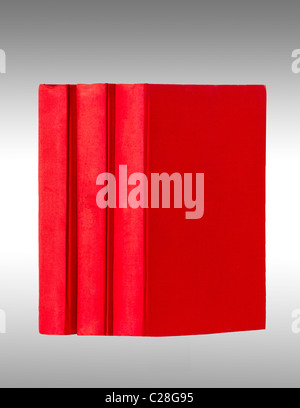 three red books untitled on a neutral background Stock Photo