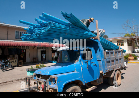 Truck carrying PVC water pipes. kalaw. Myanmar Stock Photo