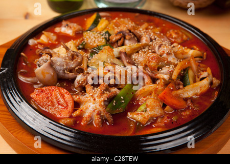 Korean food sale on restaurant , South Korea Red pepper powder Sea food stir fry with mix vegetables Stock Photo