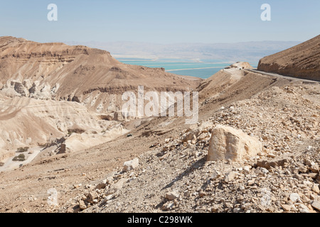 Beautiful rocky desert of Israel, the dead sea in the distance. Stock Photo