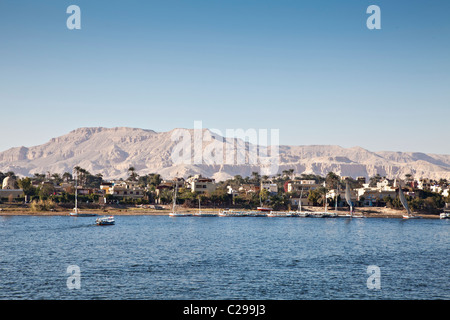 View of the west bank of the river Nile at Luxor showing the Valley of the Kings Egypt Stock Photo