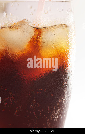 Close up view of Coca Cola in a glass bottle isolated on white ...