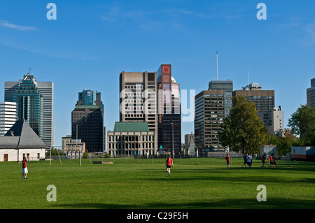 View of downtown Montreal with McGill university football stadium in front Stock Photo