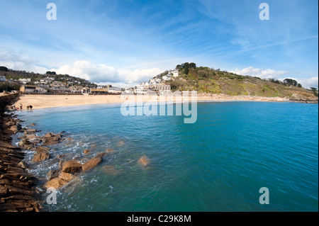 The sandy beach at Looe in Cornwall, UK on a sunny day Stock Photo