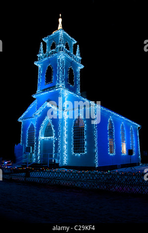 Christ Church at Upper Canada Village lit up for the Christmas holidays. Stock Photo