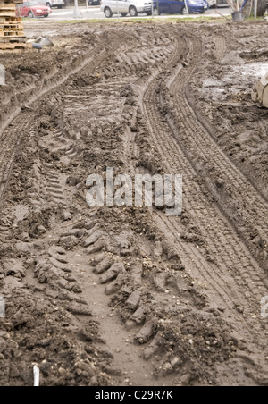 Tire tracks in the mud, storage lot, Brooklyn, NY. Stock Photo