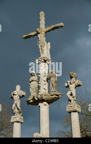 The crucifixion. Jesus and the two thieves. Details of  Guéhenno (56420) Calvary ,  Morbihan, Brittany, France, Europe. Build in 1550 by F.Guillonic Stock Photo