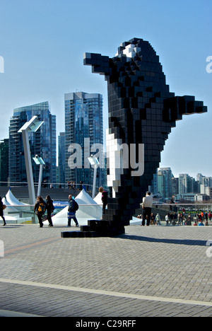 Stylized Doug Coupland Pixel Orca sculpture Jack Poole Plaza with backdrop Vancouver waterfront high rise residential towers Stock Photo