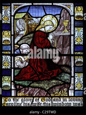 A stained glass window by Burlison and Grylls depicting The Agony of Christ in the Garden of Gethsemane Stock Photo