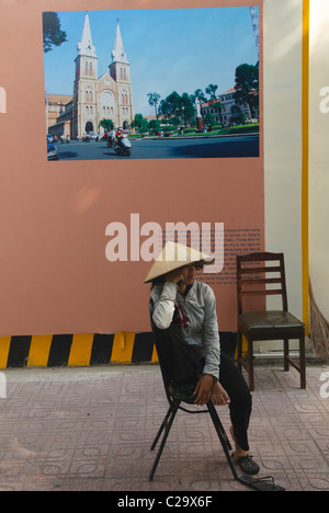 sleepy vendor in Ho Chi Minh City, Vietnam Stock Photo