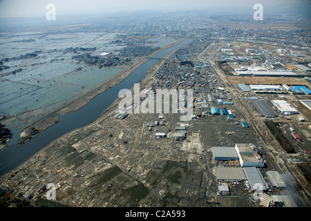 Aerial view of the devastation caused by the earthquake and tsunami in Sendai, Miyagi Prefecture after a 9. 0 magnitude Stock Photo