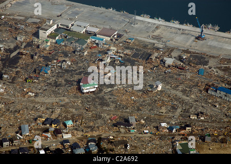 Aerial view of shattered homes and other debris that was swept inland by the tsunami that followed the March 11 magnitude 9 Stock Photo