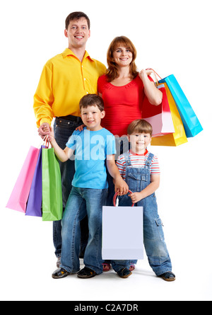 Photo of friendly parents and siblings with bags isolated over white background Stock Photo