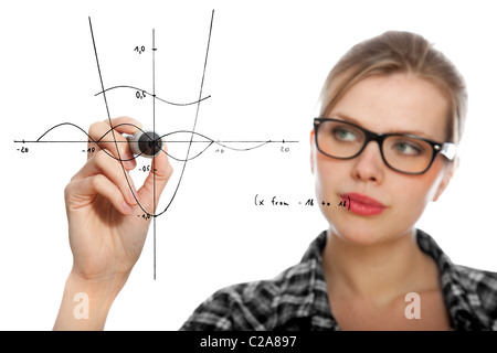 blonde student girl drawing a mathematical graph in the air, isolated on white Stock Photo