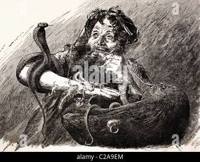 An Egyptian Dervish in the 19th century, eating scorpions. Stock Photo