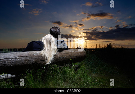 Couple watching the sunset, Reykjavik, Iceland Stock Photo