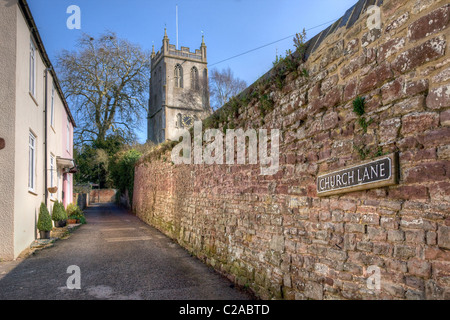 Church lane leading to St Mary the Virgin church Berkeley in Gloucestershire which has detached tower Stock Photo