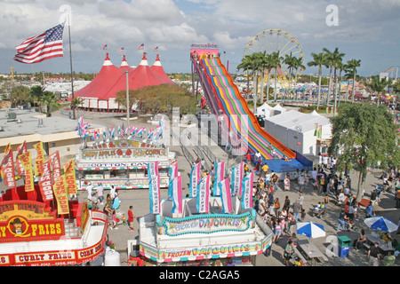 Elevated view ethnic mix people giant slide at Miami Dade County Fair Miami Florida Stock Photo