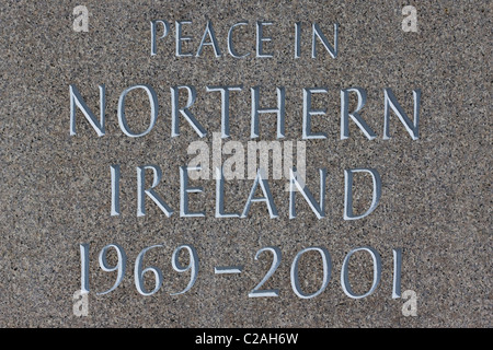 A Stone with the words Peace in Northern Ireland 1969 - 2001 Stock Photo