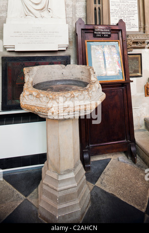 The remains of a 15th century baptismal font in Holy Trinity church, Stratford upon Avon, Warwickshire, England, UK Stock Photo