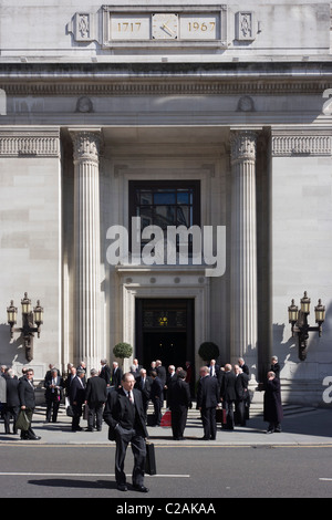 Members of Freemasonry gather outside London's United Grand Lodge at Freemason’s Hall, 60 Great Queen Street. Stock Photo