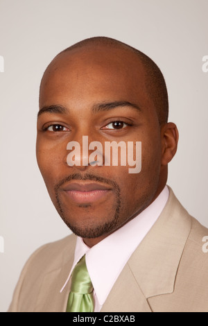 Handsome African American businessman with eye contact and happy and friendly Stock Photo