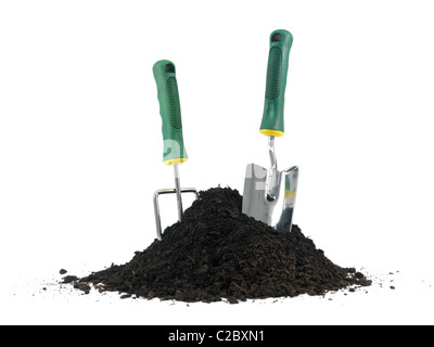 Garden soil and implements isolated against a white background Stock Photo