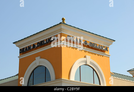 A photograph of the Dean & Deluca specialty food store in Charlotte, North Carolina on a beautiful, blue sky day. Stock Photo