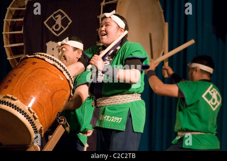 Disabled Japanese men with impaired hearing (deaf) are playing taiko drums at The Lao National Culture Hall in Vientiane, Laos. Stock Photo