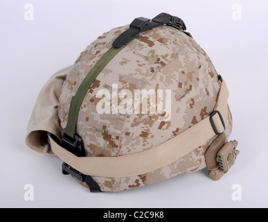 The modern USMC Marine Coprs Lightweight Combat Helmet LWH with Desert MARPAT Marine Pattern camouflage cover with IR lamp Stock Photo