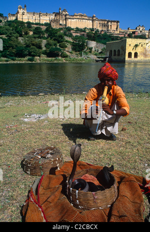 Snake-charmer by Maota Lake, Amber Fort; Jaipur, Rajasthan, India Stock Photo