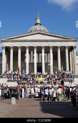 Group of students in education at the UCL historical Wilkins Building with portico colonnade on the Quad campus University College London England UK Stock Photo