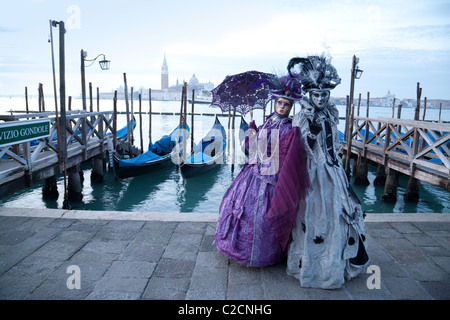 Characters in costume, posing at the venice carnival, Venice, Italy Stock Photo