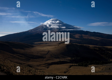 View of the Popocatepetl volcano covered by clouds in a picture taken in the Iztaccihuatl-Popocatepetl National Park, Mexico Stock Photo