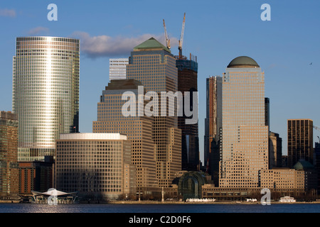 Construction Cranes atop One World Trade Center behind WFC Building 3 & 4, WFC 2 on right. Goldman Sachs headquarters on left. Stock Photo