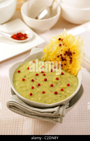 A vertical shot of a bowl of asparagus cream soup Stock Photo - Alamy