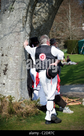 Tinners or traditional English morris men perform at licensed English fete.A morris troupe known as a side or a team, tradition Stock Photo