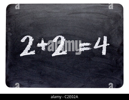 Simple mathematics sum written on a blackboard close up Stock Photo