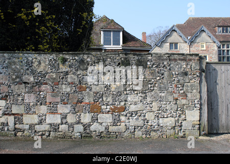 Old flint and stone wall, Cathedral Close, Salisbury, Wiltshire, England, UK Stock Photo