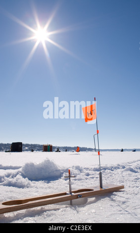 Ice fishing with tip up hi-res stock photography and images - Alamy