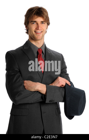Young businessman smiling and holding hat isolated over white background Stock Photo